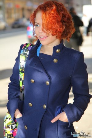 18 year old female Doris G slips off her underwear to pose naked on her bed